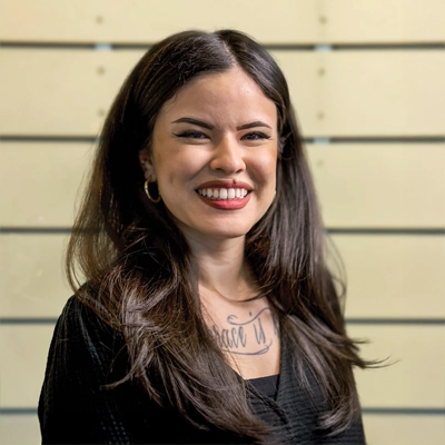 Dani Fenton smiling in a black shirt.