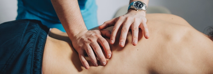 Chiropractic Torrance CA Massage Therapy A massage patient laying on a table getting a lower back massage.